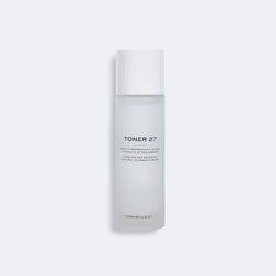 Frosted Toner 27 bottle with a white cap on a light gray background