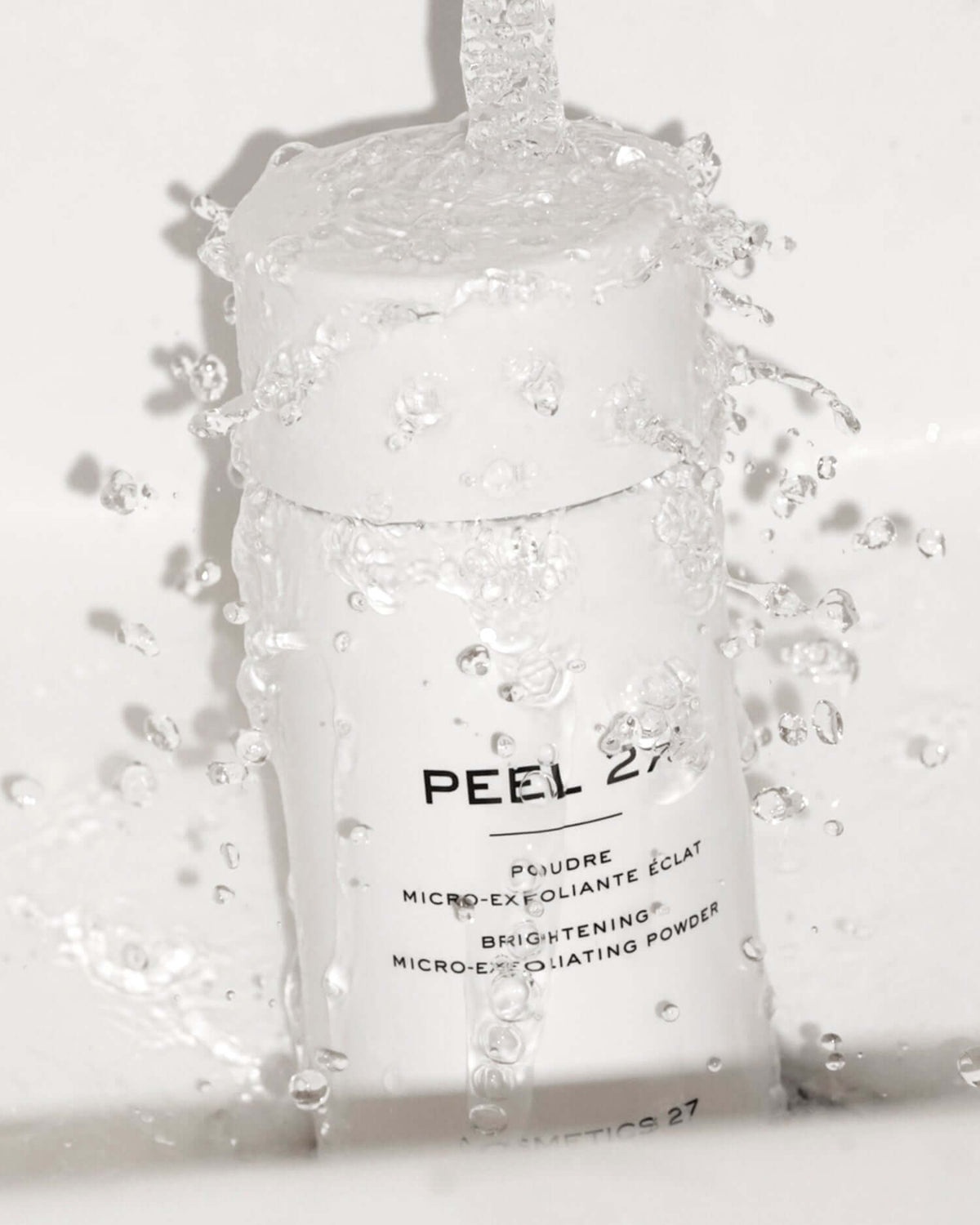 Peel 27 bottle splashed with water