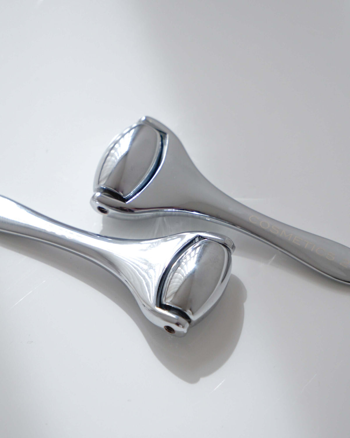 Close-up of two metal Ridoki rollers