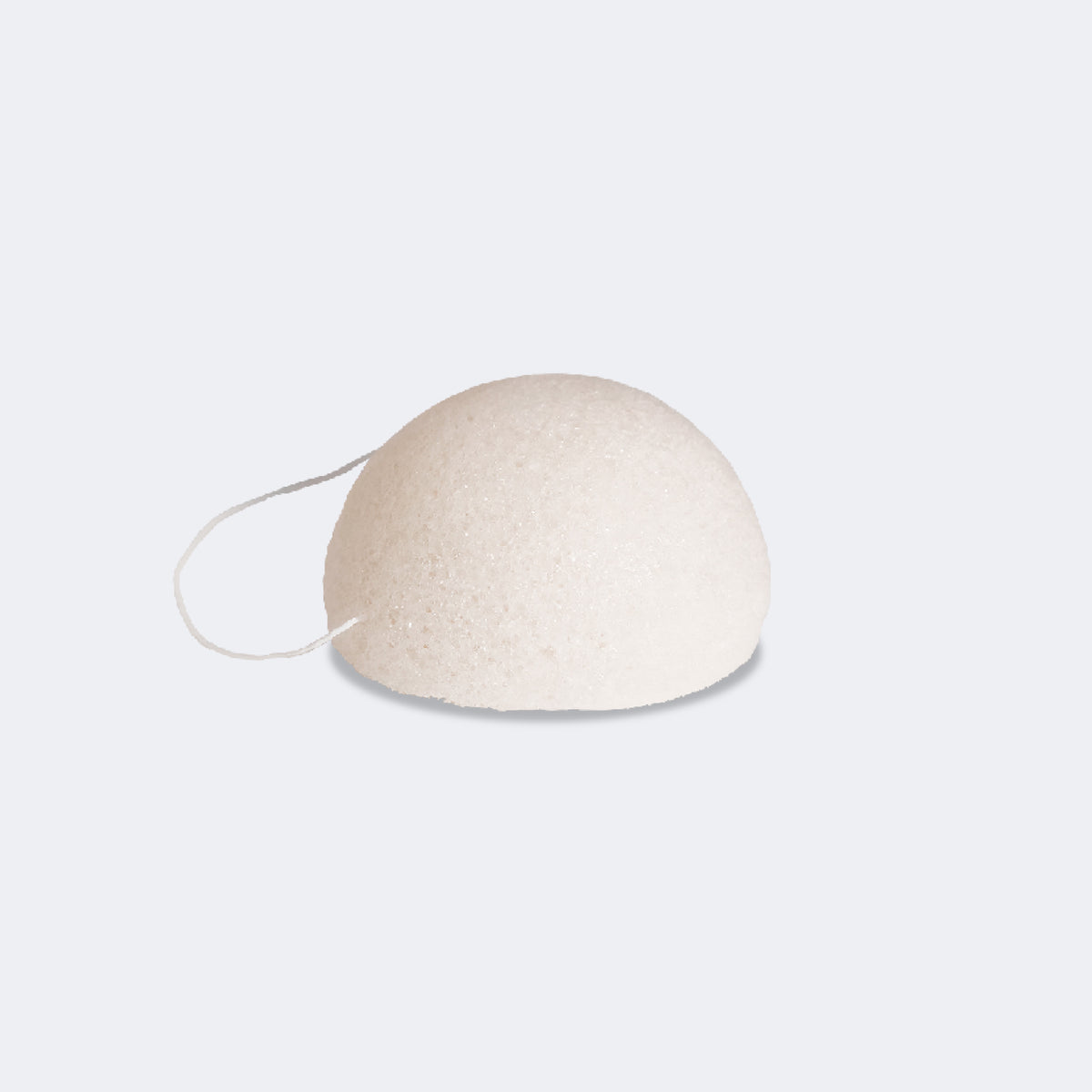 Éponge Konjac blanche en demi-sphère avec sa cordelette