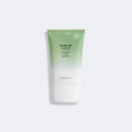 Tube vert et blanc de Pure 27 Cleanser sur fond gris clair