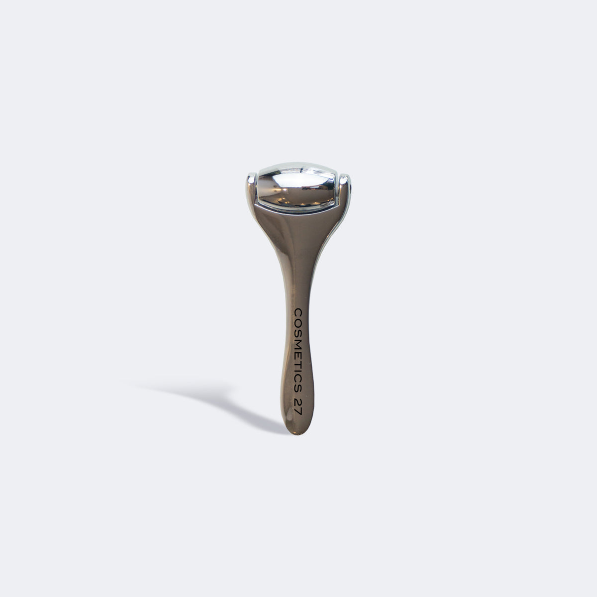 Metal Ridoki roller on a light gray background