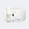 Baume 27 Serum, Essence 27 and Baume 27 Soft Cream in front of a white quilted pouch